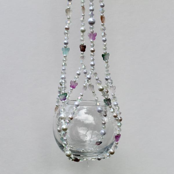 The complete Butterfly Garden beaded plant hanger, a whimsical fairycore decor piece with pastel accents.